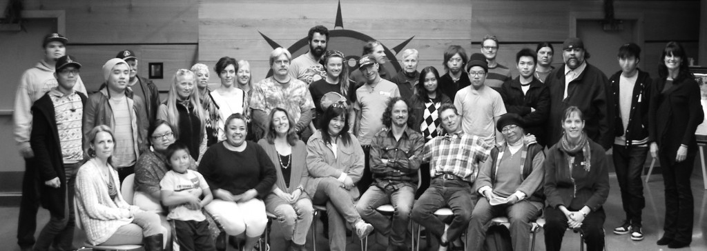 Derrick Evans, the film’s protagonist, stands third from right among students and faculty in the Longhouse. Photo courtesy of Sadie Crowe