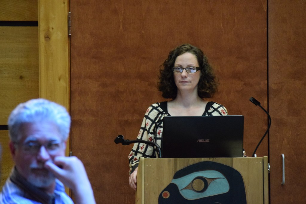 April Watkins during the Q&A portion of her capstone project in the Longhouse as Dean Bruce Hattendorf looks on. Photo by Zak Hoskins