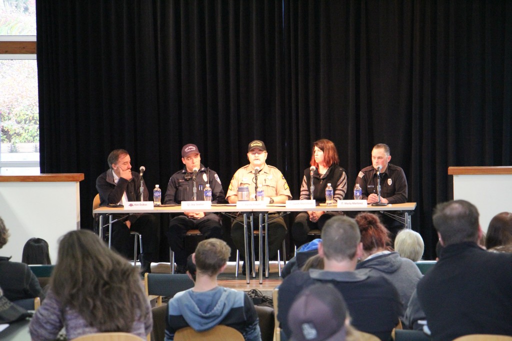 Panelists at the hostile intruder discussion in the PUB. From left: PA Fire Chief Ken Dubuc, PA Police Officer, Sky Sexton, Clallam County Sheriff Sgt. Randy Pieper, PC Mental Health Counselor Sandi MacIntosh, and Campus Safety Operations Manager Marty Martinez. - Photo by Giovanni Roverso