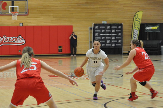 Cierra Moss drives through Lower Columbia's defense. - Photo by Mike Drake