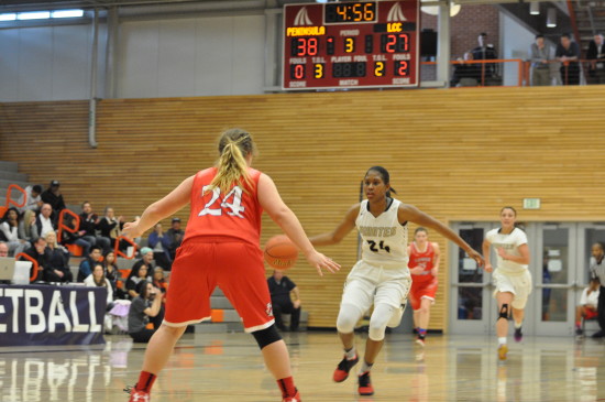 Imani Smith surveying Lower Columbia's defense. - Photo by Mike Drake
